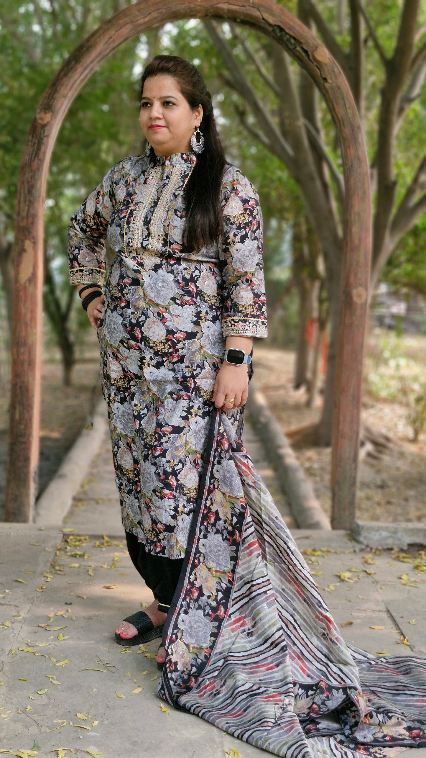 Black Floral Print Suit with Embroidered Neckline and Striped Dupatta